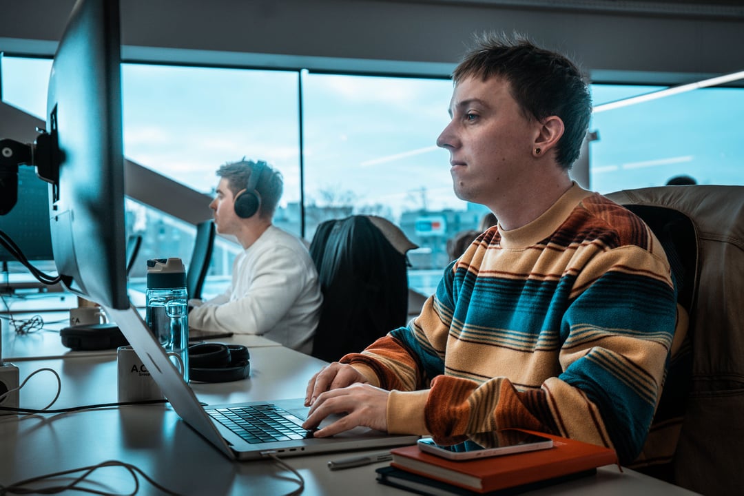 UX design team collaborating on digital product interface and user experience improvements UX design team collaborating on digital product interface and user experience improvements