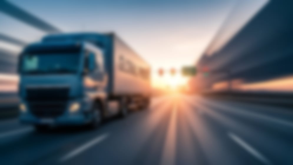 blurred truck on road blurred truck on road