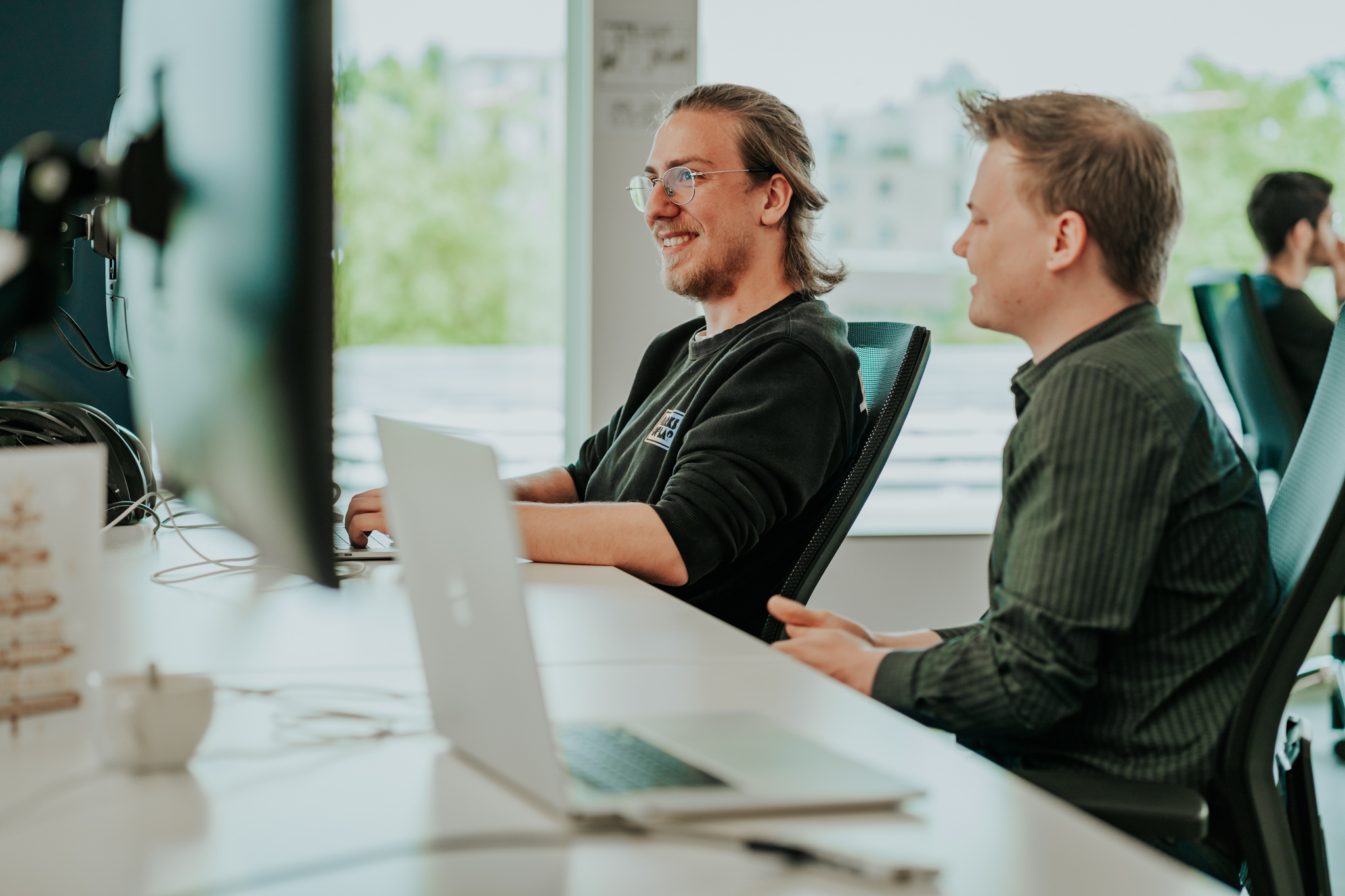 Colleagues working in pair programming